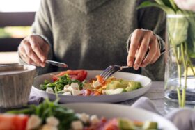 Person eating plate healthy food lifestyle