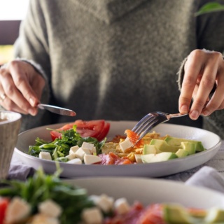 Person eating plate healthy food lifestyle