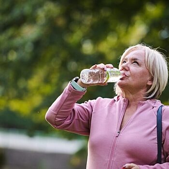 Flipped Lady drinking from bottle2