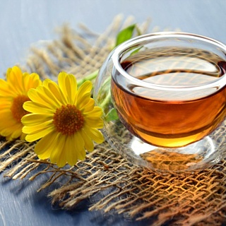 Stock Clear Glass Bowl Beside Yellow Flower